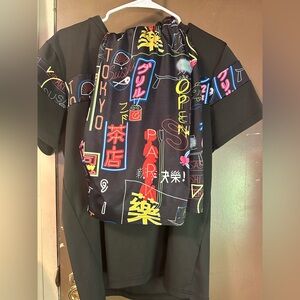 Neon and black shirt and shorts